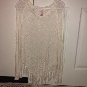 White sweater with tassels